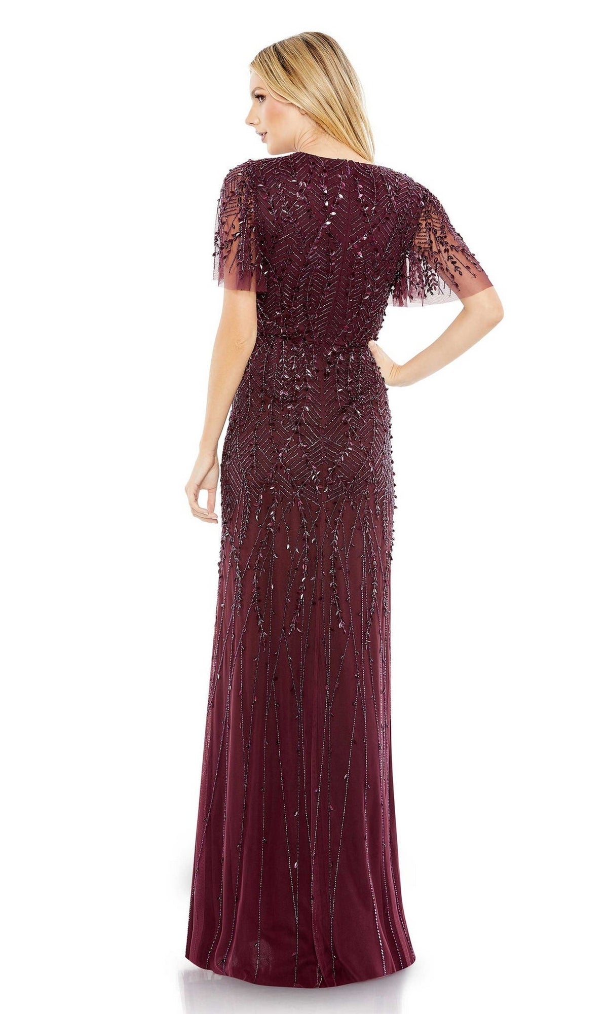 Woman wearing the Mac Duggal 35109 Flutter-Sleeve Long Formal Dress in dark burgundy, featuring beaded embellishments and short, sheer flutter sleeves, standing and facing away.